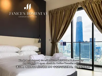 a hotel room with a bed and a large window at Continew Residence by Janice's Homestay in Kuala Lumpur