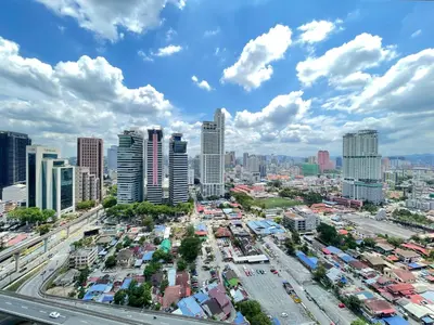 an aerial view of a city with tall buildings at De Home at Summer Suites KLCC in Kuala Lumpur