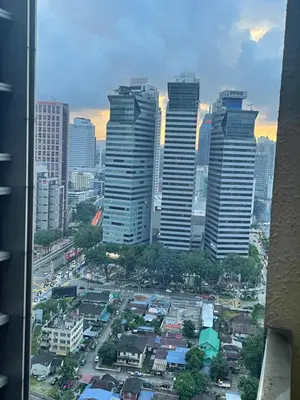 a view of a city with tall buildings at De Home at Summer Suites KLCC in Kuala Lumpur