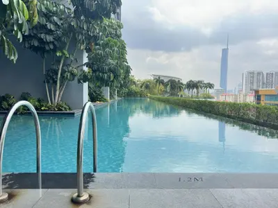 a swimming pool in a building with trees and buildings at KLCC View 1BR cozy suite with Balcony Trion B5310 KL in Kuala Lumpur