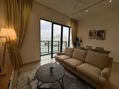 a living room with a couch and a table at TRION 2, KLCC TRX IKEA at Chan Sow Lin, Kuala Lumpur by One Guesthouse in Kuala Lumpur