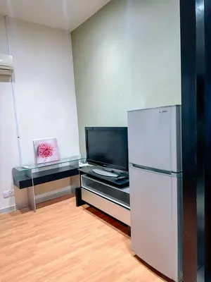 a kitchen with a refrigerator and a glass counter at Parkview KLCC ITSKAYA 21 NEW in Kuala Lumpur