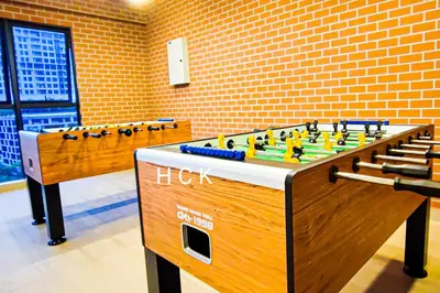 a table with toys on it in a room at KL City View at Trion 2 by HCK in Kuala Lumpur