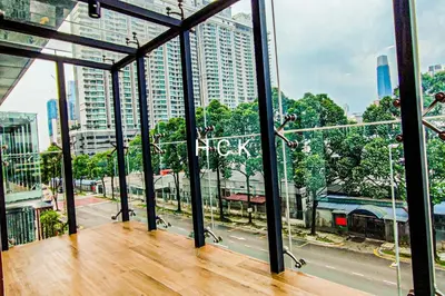 a view of a city street from a balcony at KL City View at Trion 2 by HCK in Kuala Lumpur