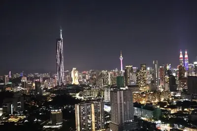 a night view of a large city at night at Trion SFM Dream Service suit in Kuala Lumpur