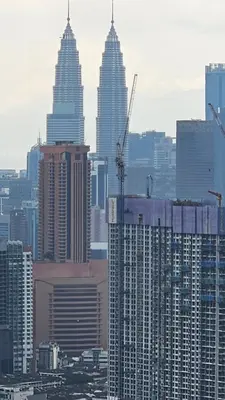 a view of a city with tall skyscrapers at Trion SFM Dream Service suit in Kuala Lumpur