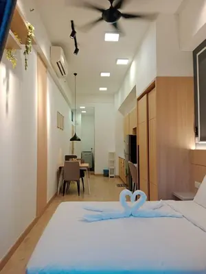 a bedroom with a bed with two hearts on it at The Luxe KLCC by NZ in Kuala Lumpur