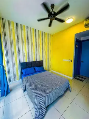 a bedroom with a bed with a ceiling fan at Nordic Europe Style in Kuala Lumpur
