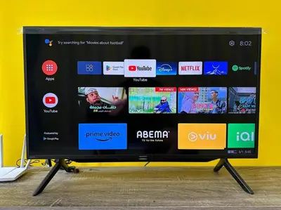a tv on a stand with different types of screens at Nordic Europe Style in Kuala Lumpur