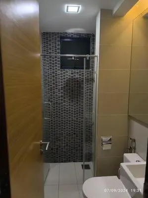 a bathroom with a shower with a toilet and a sink at 0203 Sweet Home-Casa Residency 2R 2B City View in Kuala Lumpur
