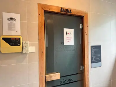 a glass door in a bathroom with a sign on it at 8 KLCC 5 minutes to Jalan Alor Street Bukit Bintang Pavilion 10 Pax 3R2B in Kuala Lumpur