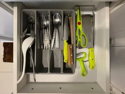 a drawer filled with utensils in a kitchen at The Robertson Bukit Bintang by DeUrban in Kuala Lumpur