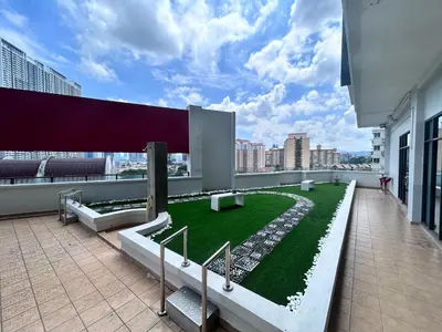 a balcony with stairs and grass on a building at Private Cinema and Jacuzzi at Pertama Residency in Kuala Lumpur