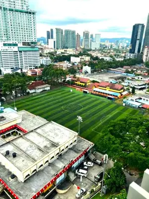 an aerial view of a soccer field in a city at The Luxe Colony KLCC BY Infinitum in Kuala Lumpur