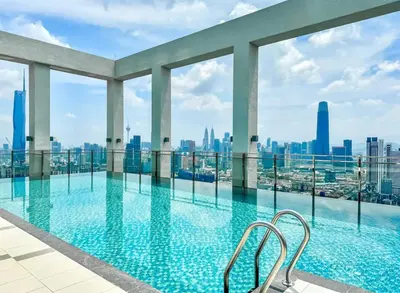a swimming pool with a view of the city at trion2 Kuala lumper near KLCC TRX bukit bin tang in Kuala Lumpur