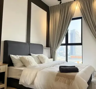 a bedroom with a large bed with a large window at trion2 Kuala lumper near KLCC TRX bukit bin tang in Kuala Lumpur