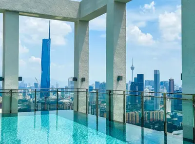 a swimming pool on the roof of a building with a view at trion2 Kuala lumper near KLCC TRX bukit bin tang in Kuala Lumpur