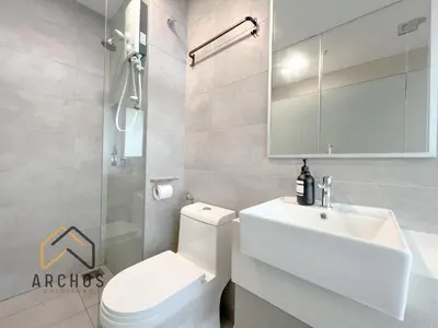 a bathroom with a white toilet and a sink at Riveria City Kuala Lumpur Sentral by Archos in Kuala Lumpur