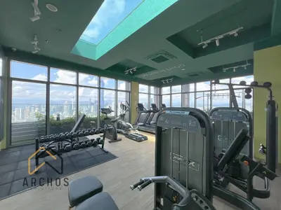 a gym with a bunch of treadmills and machines at Riveria City Kuala Lumpur Sentral by Archos in Kuala Lumpur