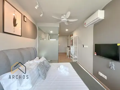 a bedroom with a bed and a flat screen tv at Riveria City Kuala Lumpur Sentral by Archos in Kuala Lumpur