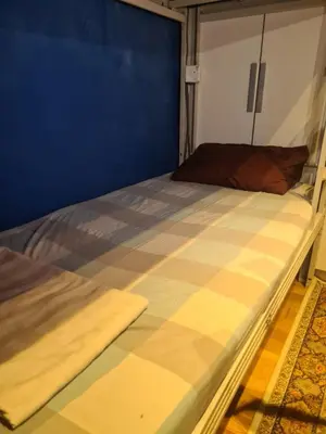 a bed in a room with a mattress at Infinity View KL Hostel in Kuala Lumpur