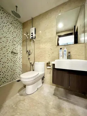 a bathroom with a toilet and a sink at Infinity View KL Hostel in Kuala Lumpur