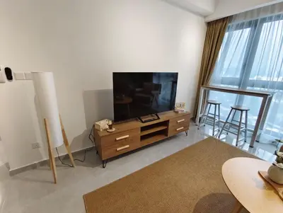 a living room with a flat screen tv on a dresser at Agile Bukit Bintang KLCC City Centre Kuala Lumpur Malaysia in Kuala Lumpur