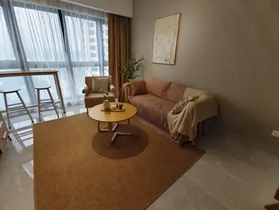 a living room with a couch and a table at Agile Bukit Bintang KLCC City Centre Kuala Lumpur Malaysia in Kuala Lumpur