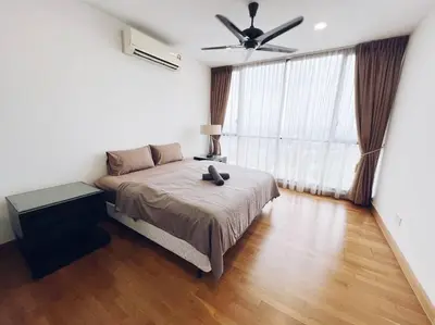 a bedroom with a bed and a ceiling fan at PROMO Connected train 3 Bedrooms - Above Mall 25 in Kuala Lumpur