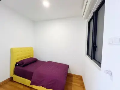 a small bed in a white room with a window at PROMO Connected train 3 Bedrooms - Above Mall 25 in Kuala Lumpur