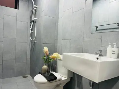 a bathroom with a white sink and a toilet at MVD41#Family Suite 8pax 3 Rooms M Vertica Velocity Mall Cheras IKEA Mytown Short Walk to MRT & LRT Maluri in Kuala Lumpur