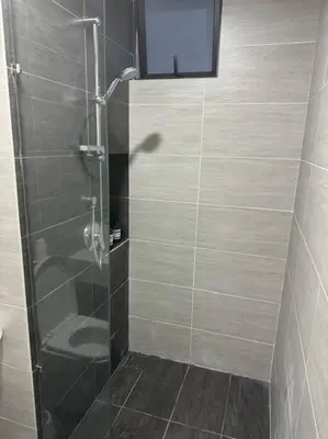 a shower with a glass door in a bathroom at TRION KL, KLCC TRX IKEA at Chan Sow Lin, Kuala Lumpur by ONE Guesthouse in Kuala Lumpur