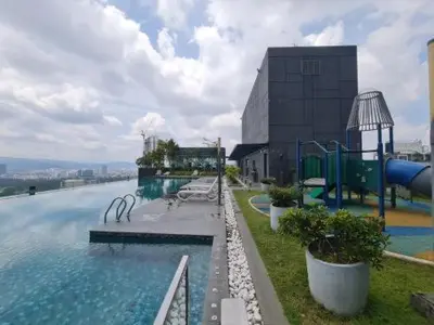 a large swimming pool on top of a building at Super suite at Dorsett residence bukit bintang kl in Kuala Lumpur