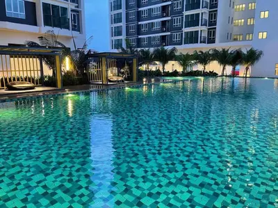 a large swimming pool in front of some buildings at Setapak KL Apt 3 Room 8 pax in Kuala Lumpur