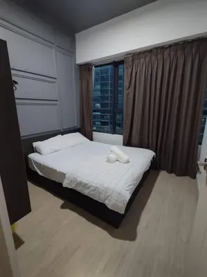 a bedroom with a bed and a window with a view at apartment for classic lover in Kuala Lumpur