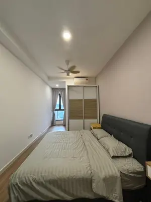 a bedroom with a bed and a ceiling fan at Modern Luxury Apartment, Sunway, TRX in Kuala Lumpur