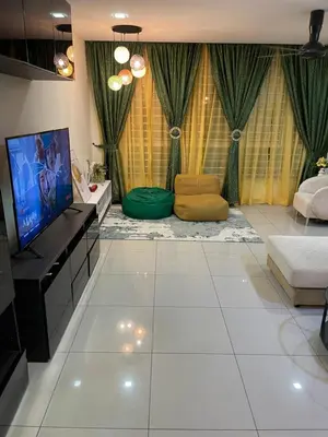 a living room with a tv and a couch at cozy 3 bedroom 6PAX setapak central mall in Kuala Lumpur