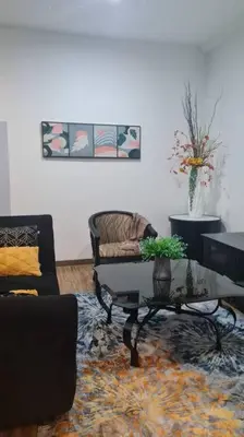 a living room with a couch and a coffee table at Phenomenal atmosphere 4 PAX setapak central mall in Kuala Lumpur