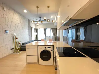 a kitchen with a washing machine in the middle of it at STAR RESIDENCE KLCC By GANTYA in Kuala Lumpur