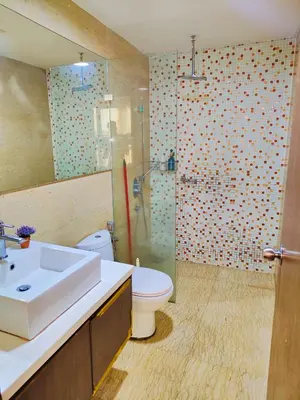 a bathroom with a sink and a toilet and a shower at Casablanca Skypool Hostel in Kuala Lumpur