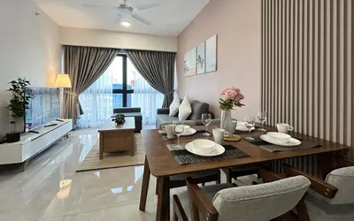 a living room with a dining room table and a couch at AGILE Bukit Bintang By Irent365 in Kuala Lumpur