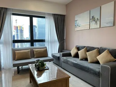 a living room with a couch and a table at AGILE Bukit Bintang By Irent365 in Kuala Lumpur