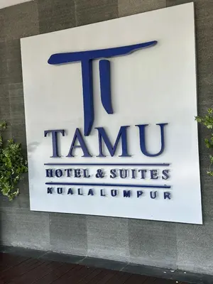 a sign for the tarmac hotel and suites kuala lumpur at Tamu Hotel & Suites Stay in Kuala Lumpur