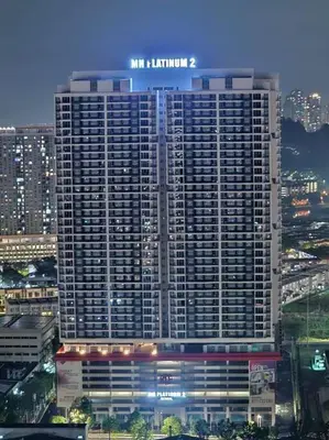a large building with a sign on top of it at Cozy Homestay KL Setapak 2R2B 1CarPark, Pool, Wifi, MALAYSIAN ONLY & MUS-LIM RECOMMENDED in Kuala Lumpur