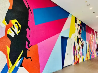 a wall with a colorful mural on the wall at Star Residence KLCC By Starlight in Kuala Lumpur