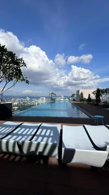 a swimming pool with a view of a city at Riveria Suites, KL Sentral by Homebrickz in Kuala Lumpur