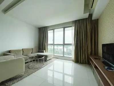 a living room with a couch and a large window at Regalia by sweet home in Kuala Lumpur