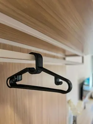 a black door handle on a wooden door at Riveria City KL Sentral by Sleepy Bear in Kuala Lumpur