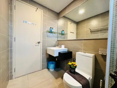 a bathroom with a toilet and a sink at Velocity Residence linkway Sunway mall in Kuala Lumpur