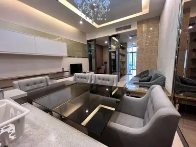 a large living room with couches and a table at Dorsett Bukit Bintang with Bathtub by Prestige in Kuala Lumpur